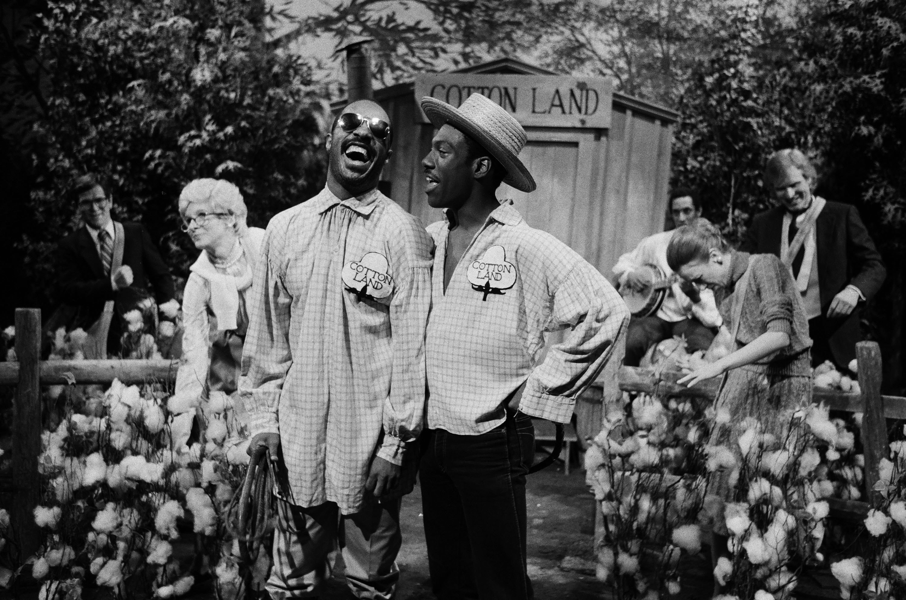 Stevie Wonder, left, as Big Julian Masters, Eddie Murphy as Big Sam during the 'Cotton Land' skit on Saturday Night Live on May 7, 1983.