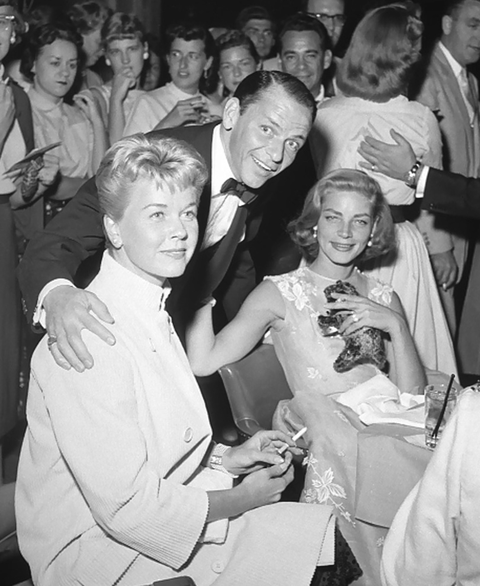 (L-R) Doris Day, Frank Sinatra and Lauren Bacall are pictured at the Sands Hotel on Sept. 14, 1956, in Las Vegas, Nev.