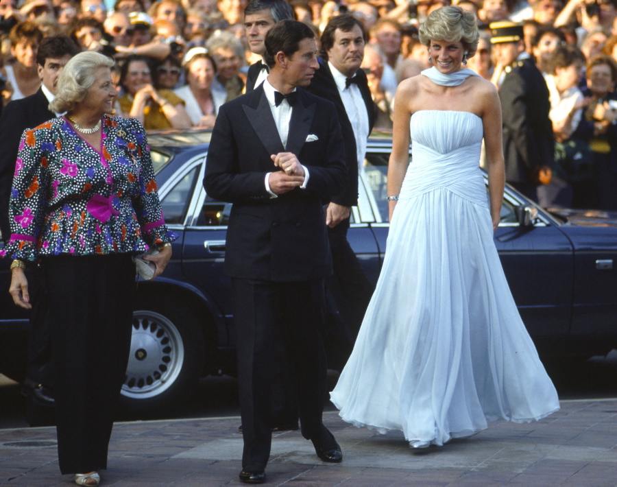 Princess Diana's iconic pale blue silk chiffon strapless dress at Cannes was created by one of her favorite designers, Catherine Walker. The then-Princess of Wales attended Cannes with Prince Charles in May 1987.