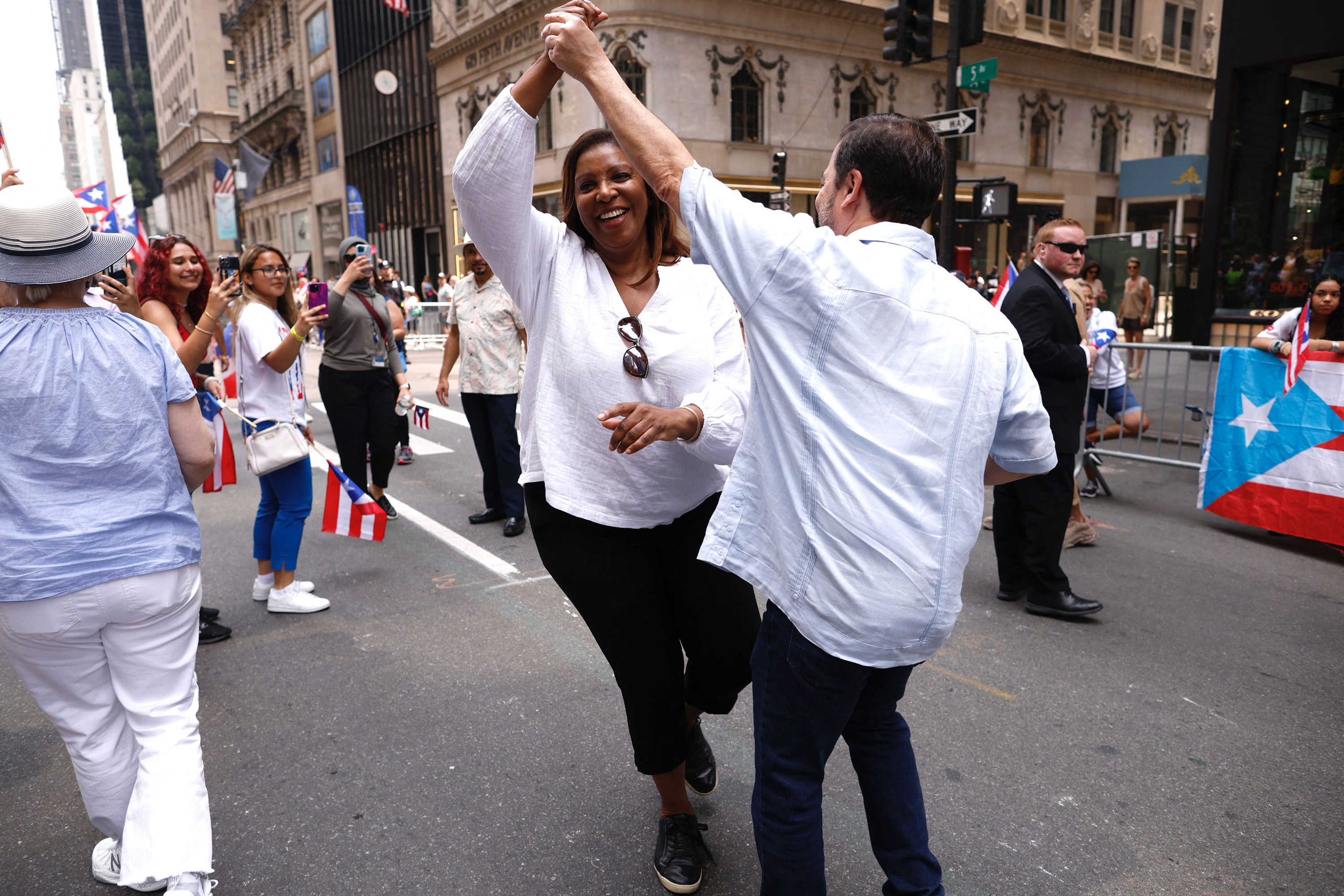 New York Attorney General Letitia James dances during the 66th annual National Puerto Rican Day Parade in New York City on June 11, 2023.