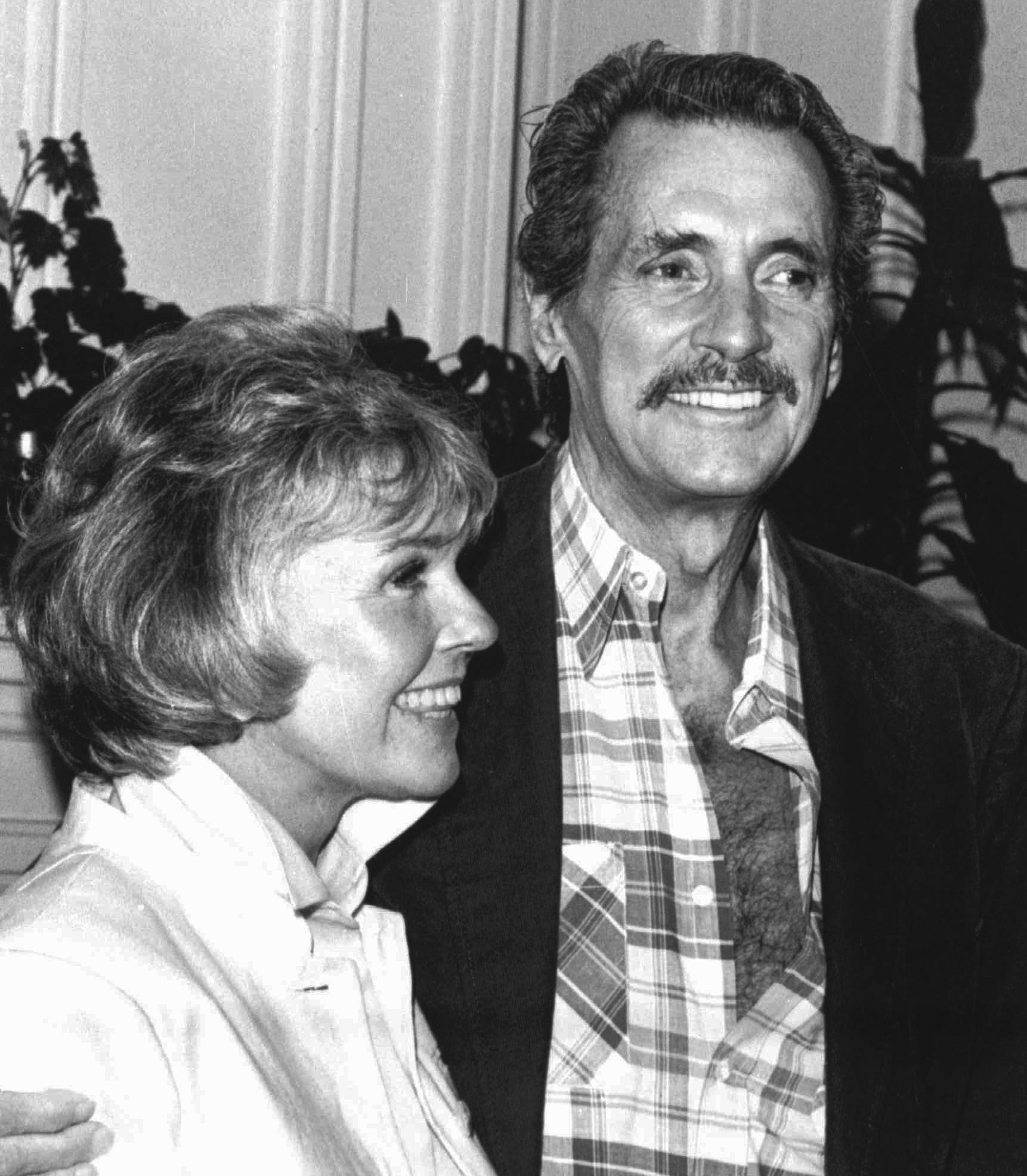 Doris Day and Rock Hudson speak at a news conference on July 18, 1985, in Monterey, Calif.