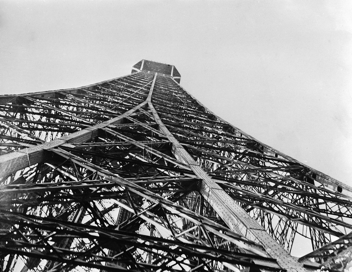 With an average of seven million visitors a year, the Eiffel Tower is the most popular paid-entry monument in the world. Pictured is the structure under construction in 1887.