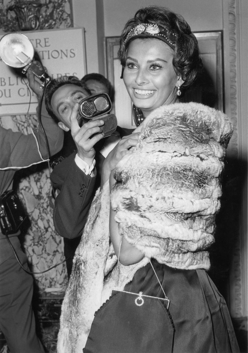 Leave it to the Italian actress Sophia Loren to bring plenty of glitz and glam to the Cannes Film Festival. Here, Loren sends photographers into a frenzy as they snap photos of the star making her grand entrance on May 5, 1958.