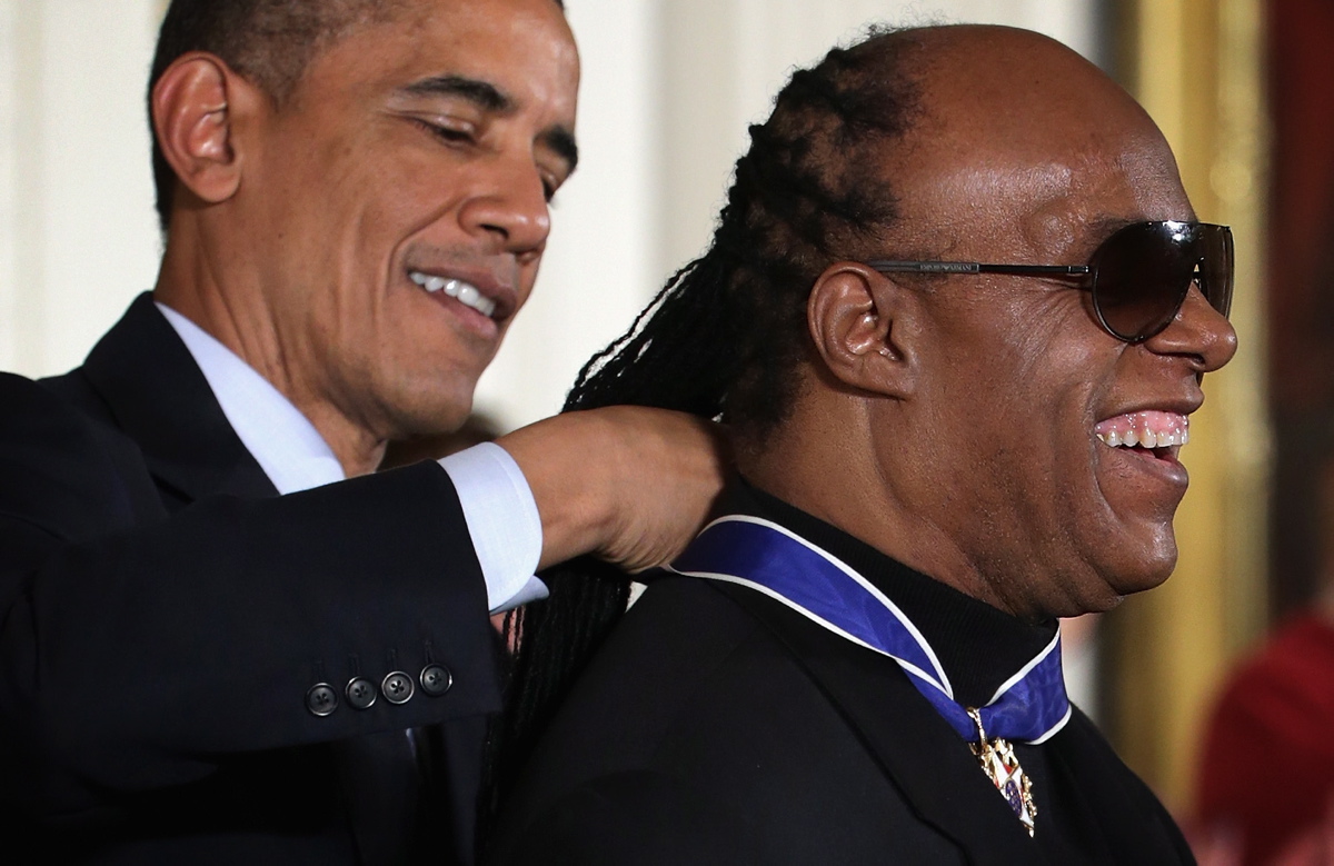 Former President Barack Obama presented the Presidential Medal of Freedom, the nation's highest civilian honor, to Stevie Wonder during an East Room ceremony at the White House on Nov. 24, 2014.