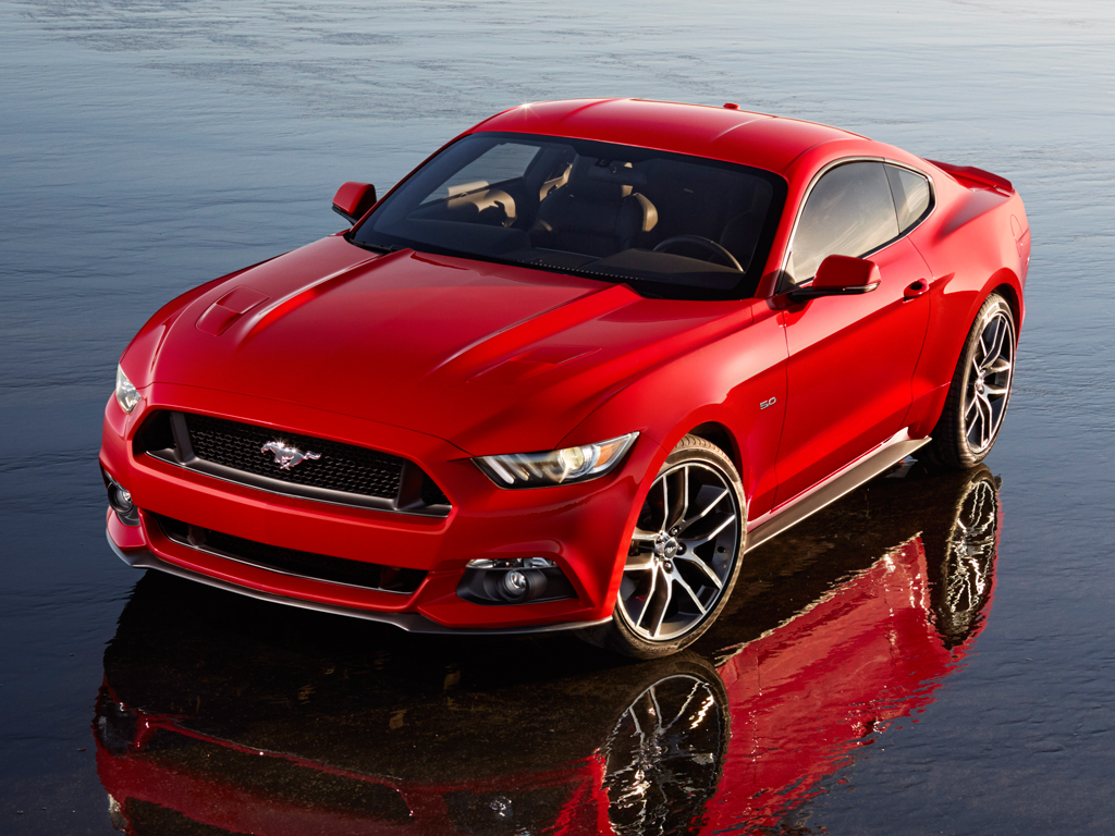 A wider and lower body set the new Mustang apart, along with a more efficient 2.3-liter EcoBoost four-cylinder engine being made available in the Mustang for the first time.