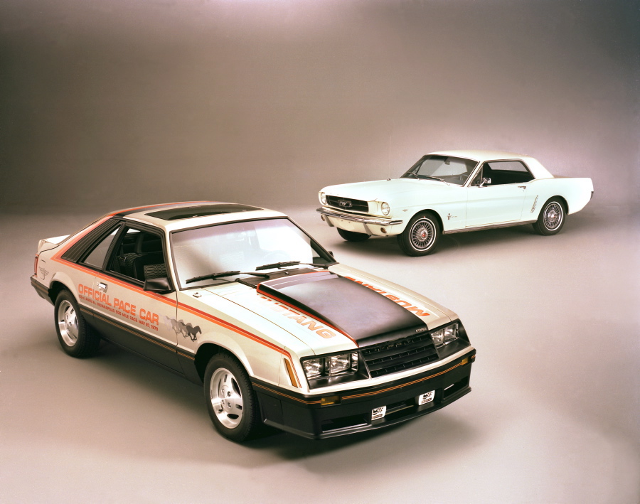 The '79 Mustang (foreground) is seen with the original 1965 Mustang, demonstrating the various changes to the pony car's styling and shape in less than 15 years.