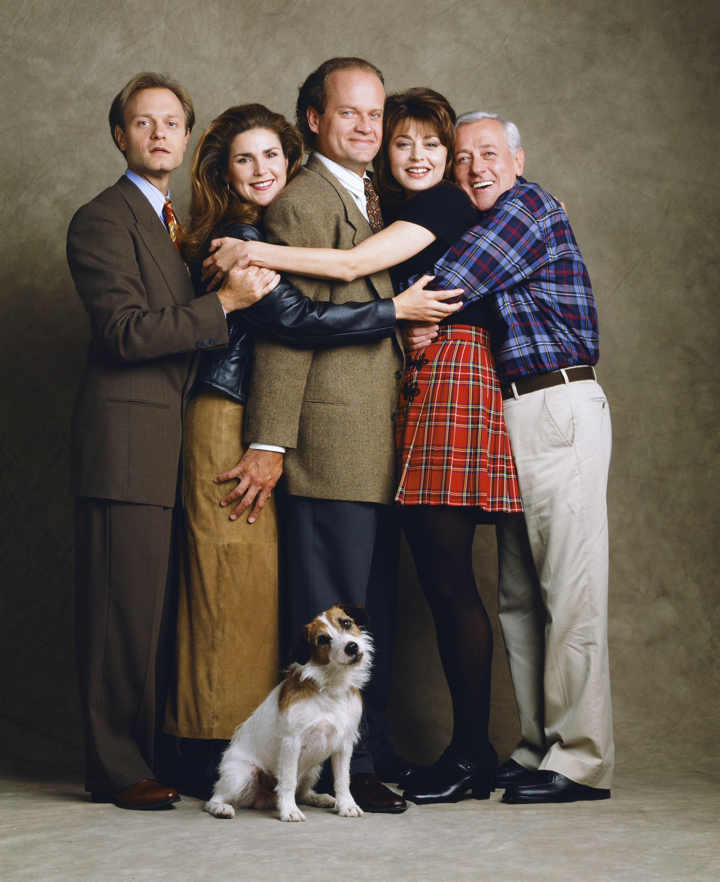 (L-R) David Hyde Pierce as Doctor Niles Crane, Peri Gilpin as Roz Doyle, Kelsey Grammer as Doctor Frasier Crane, Jane Leeves as Daphne Moon, John Mahoney as Martin Crane and Moose as Eddie pose in a promotional photo for season two.